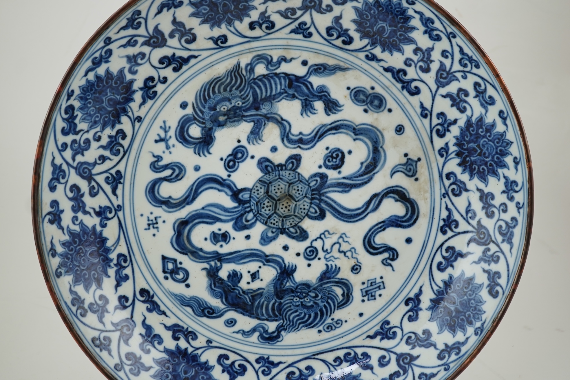 A Chinese blue and white 'Buddhist lions' dish, Ming Dynasty or later